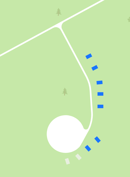Illustrated map of Tiny Woods Campground showing the RV sites laid out along the loop road and around the pond